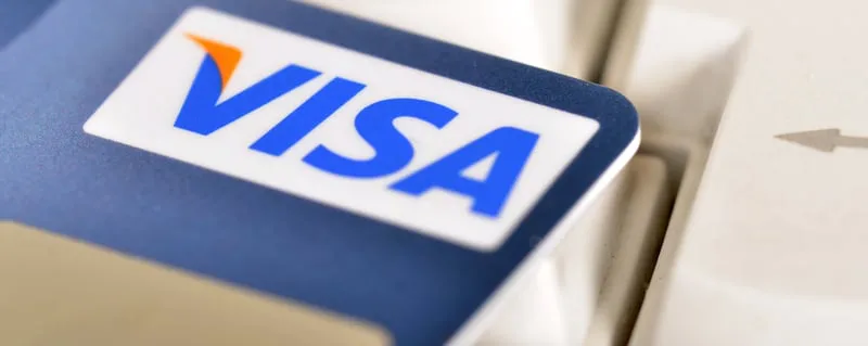 Alchemy AgentCard interface representing AI agents gaining Visa network access to execute purchases on behalf of human users