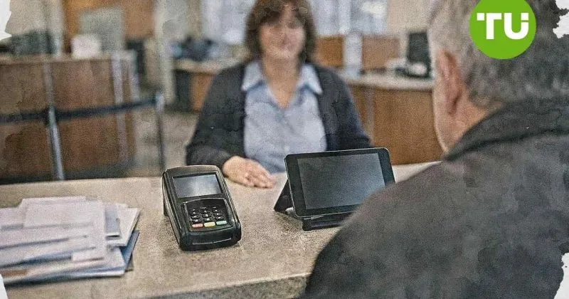 Man reviewing financial data representing credit unions joining a stablecoin payments pilot